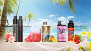 A group of cheap vape bottles on a beach.